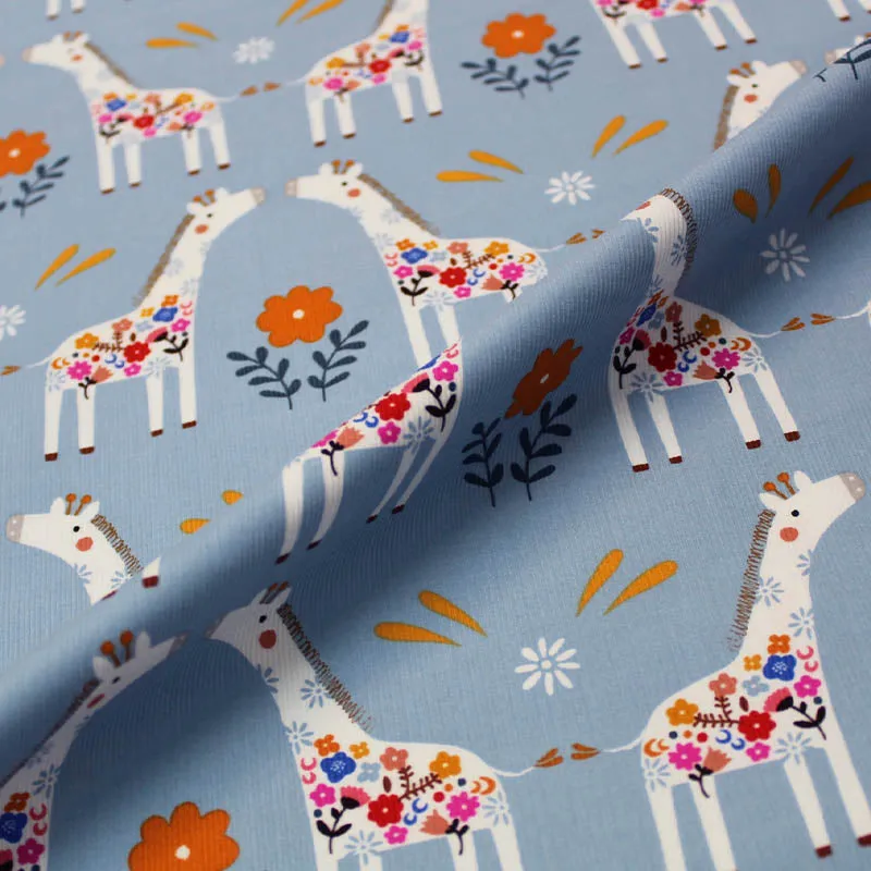 Dressmaking Needlecord - Pale Blue - Kissing Giraffes