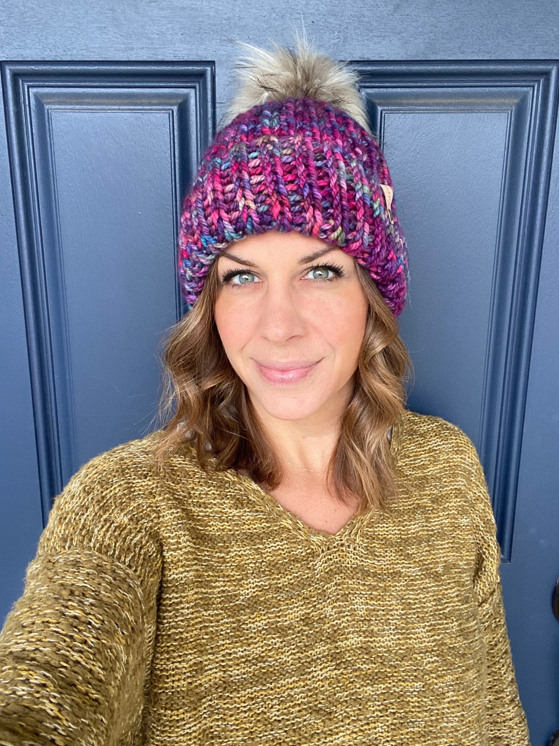 Merino wool folded brim knit hat with faux fur Pom