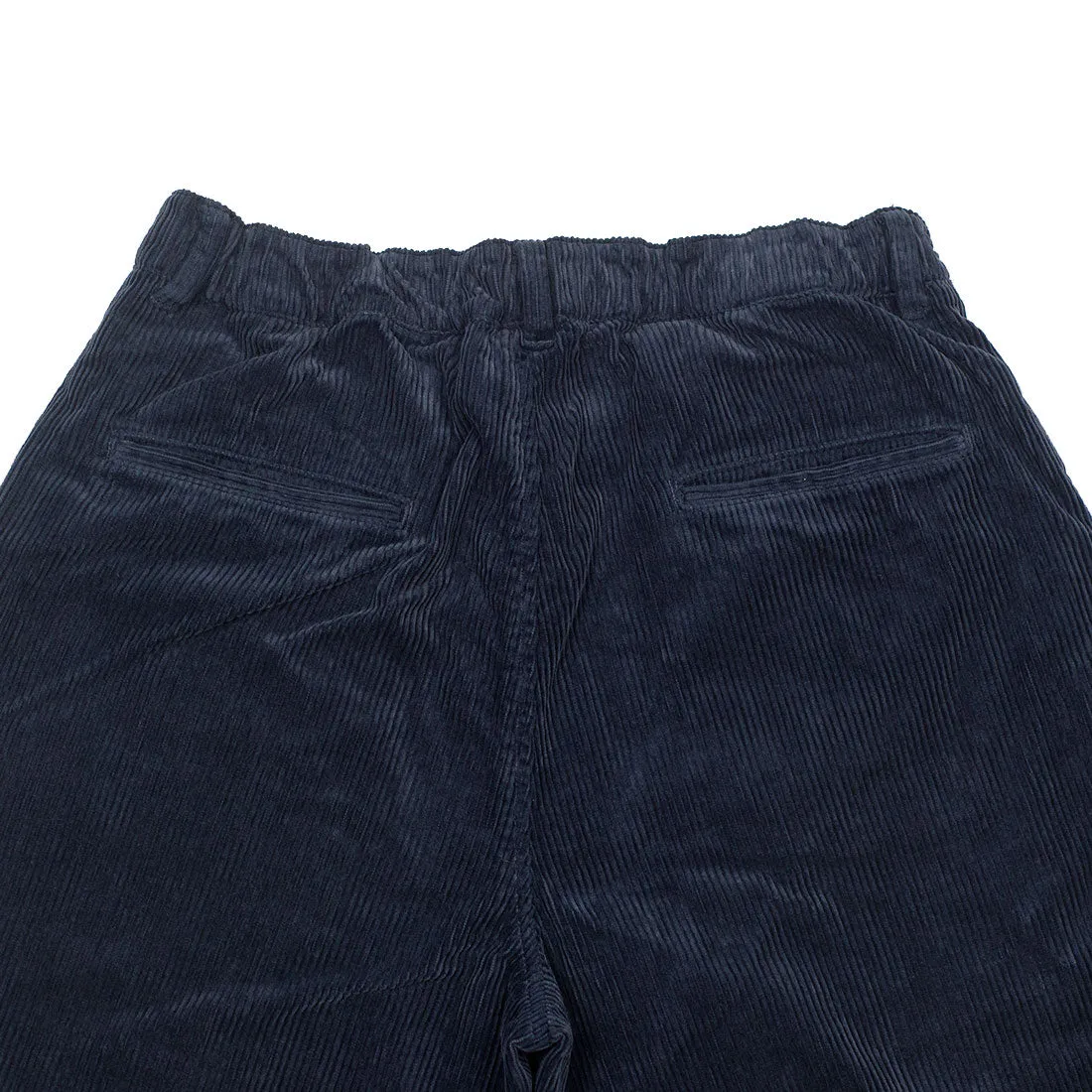 One tuck trousers in indigo-dyed cotton corduroy
